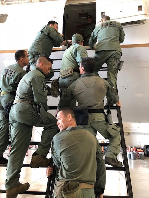 SSD officers training entering a plane