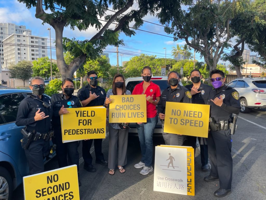 District 1 Community Policing Team at a traffic safety sign-waving event.