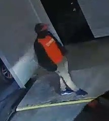 Suspect #1 – Unknown male, medium build, wearing a red hat, black jacket, red shirt, tan pants, and black shoes