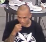 Photo of the suspect wearing a black t-shirt with a Playboy bunny print on it