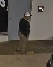 Suspect #2 – Unknown male, medium build, wearing a white hat, black t-shirt, tan pants, and black shoes