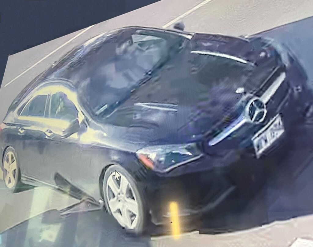 Suspect Vehicle – 2016 black four-door Mercedes-Benz with a dark tint and black rims, Hawaii license plate WFW 094