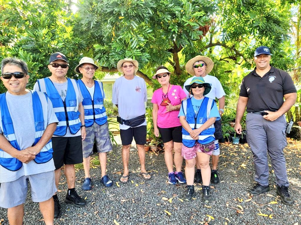 Maunaloa NSW members walk with District 7 officer