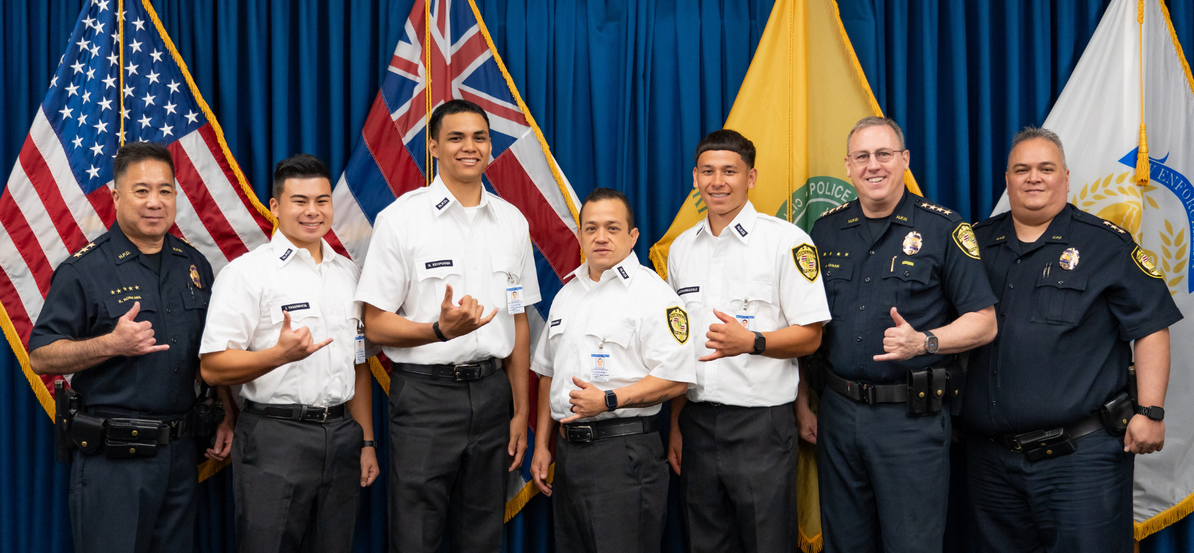 Graphic slider for homepage to highlight the Police Services Officer (PSO) position. Photo consists of four PSO individuals and Chiefs Loga, Horikawa, and Vanic.