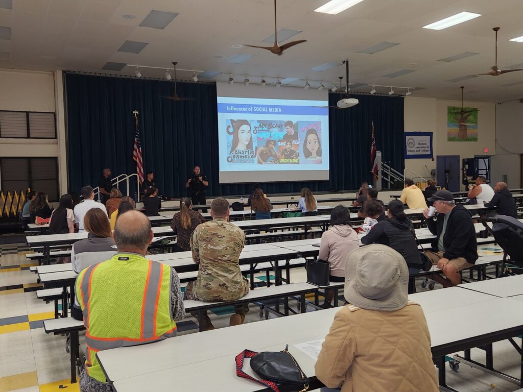 Parent meeting at Mililani Middle School, where officers informed the community on the current crime trends.