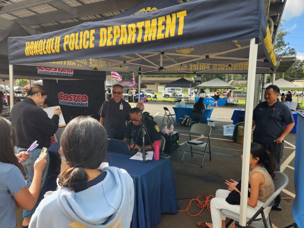 Officers participated in a community fair and gave out free keiki id