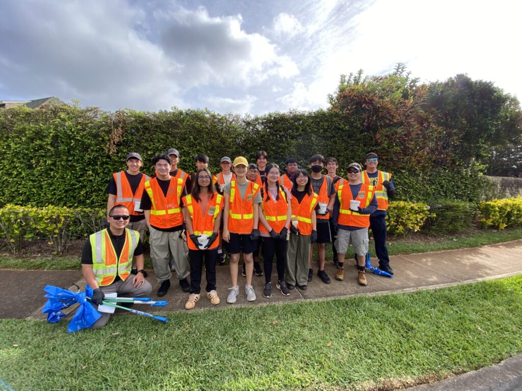 Officers and students from Mililani High school went around Mililani to cleanup graffiti and trash