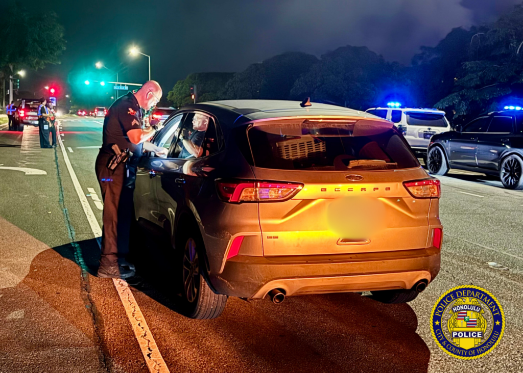 Traffic Division Honors Azalia Park with Sign-Waving and Checkpoint. Over the weekend, officers from the Traffic Division partnered with SafeRide Hawaiʻi, MADD Hawaiʻi, and the Keiki Injury Prevention Coalition Hawaiʻi for a sign-waving event in remembrance of Azalia Park, a victim of impaired driving in December 2020. Officers then conducted a sobriety checkpoint in the area, where sober drivers were thanked with a gift from MADD Hawaiʻi for choosing to drive sober. 🚗💙 Remember, making good decisions affects us all and helps ensure safer roads for everyone. 🌟 #SaferRoadsTogether #DriveWithAloha #SafeEveryMile
