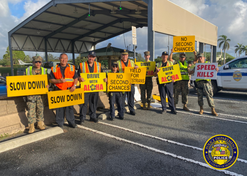 🚓🤝 HPD officers from District 4 Community Policing Team and District 6 Fourth Watch partnered with the Marine Corps Base Hawaiʻi Provost Marshal’s Office to promote traffic safety. The initiative began with sign waving at the base entrance, reminding drivers to “Slow Down,” “Drive with Aloha,” and including the sobering reminder that “Speed Kills.” Officers also conducted a speeding operation as part of the effort, issuing over 20 speeding citations. 🚗💙 Traffic safety starts with each of us. Slow down, stay alert, and drive with aloha to help keep our roads safe for everyone. #CommunityPolicing #TrafficSafety #SaferRoadsTogether #DriveWithAloha #SafeEveryMile