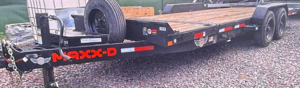 A maxey trailer with MAXX-D lettering on the drivers’ side frame
