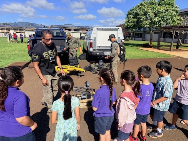 District 2 Officers, alongside HPD SSD and Solo bike Officers participated in Hanalani Schools Community Helpers Day