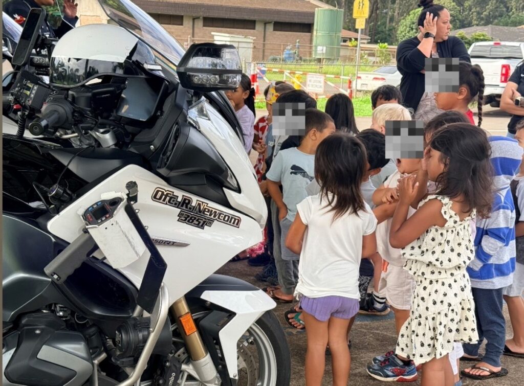 HPD Officers with Solo Bike spoke with students at Ka'ala Elementary regarding their role within the department
