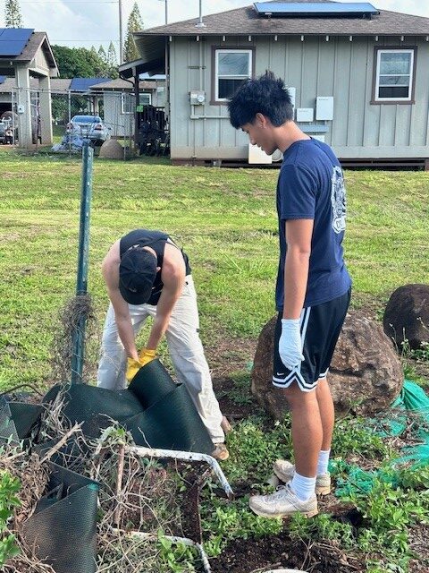 HPD D2 Officers partnered up with Mililani High School Law Enforcement Class to perform community service at Kunia Farms