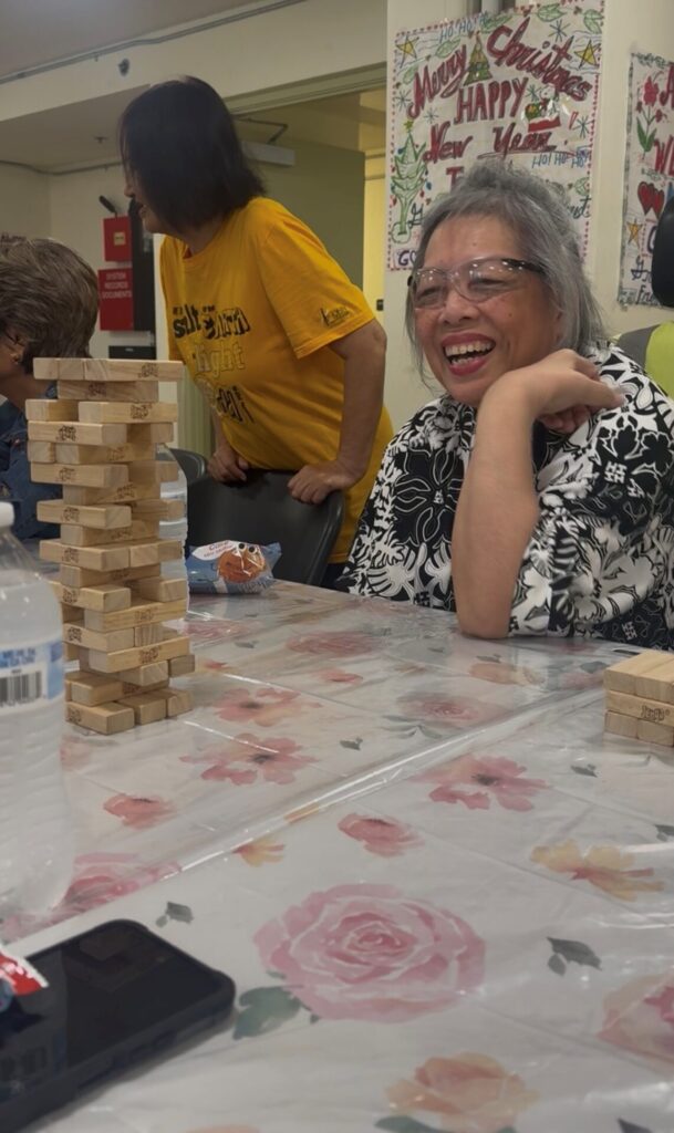 D2 Officers challenge residents at Silvercrest senior living to a game of Jenga!