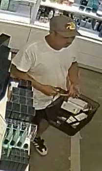 Unknown male wearing a Bass Pro Shops baseball cap and Adidas shoes as shown on surveillance camera