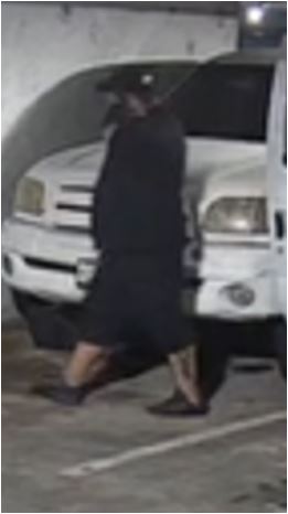 Unknown male suspect wearing a baseball cap as shown on surveillance camera