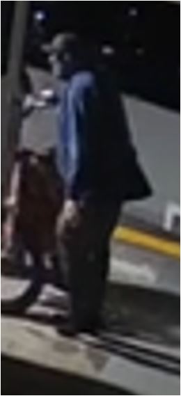 Unknown male suspect wearing a baseball cap as shown on surveillance camera