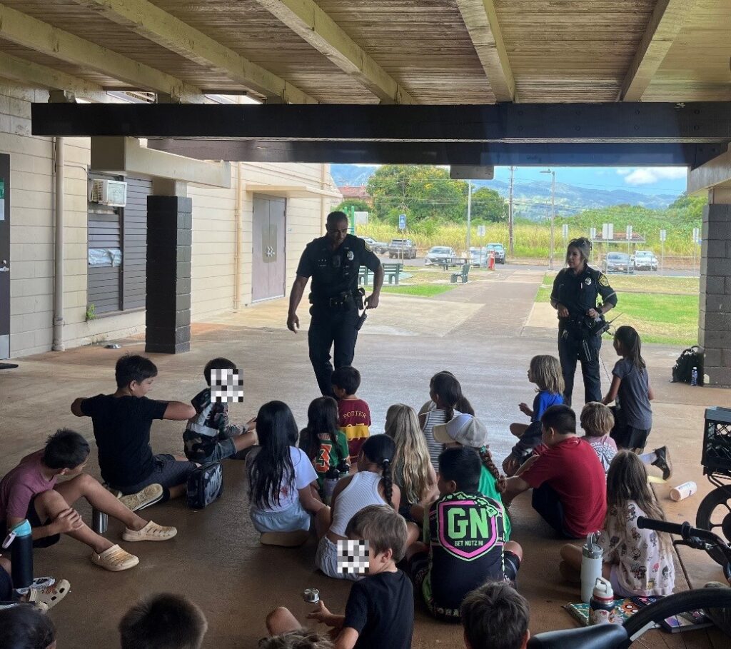 District 2 Officers attended a Say Hi at Waialua Gym Summer Fun showing the Keiki Officer's equipment, explaining what we do and having them tour the police vehicle