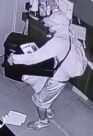 Unknown male suspect with tattoos on right shin and hand as shown on surveillance camera