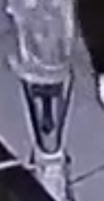 Unknown male suspect with tattoos on right shin and hand as shown on surveillance camera