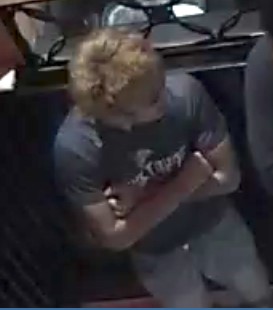 Unknown male with bleached hair as shown on surveillance camera