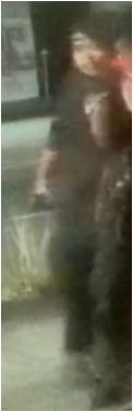 Unknown male wearing a backwards baseball cap and a rattail hairstyle as shown on surveillance camera