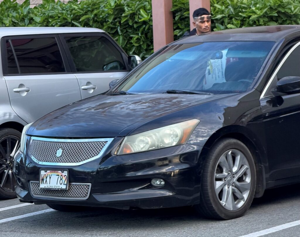 2011 Honda Accord with a modified grill as shown on surveillance camera