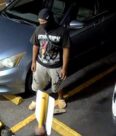 Unknown male suspect with a Nike brand balaclava and tribal graphic print shorts as shown on surveillance camera