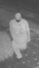 Unknown male suspect with a unique shirt with words Just Hustle printed on the back as shown on surveillance camera